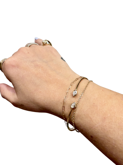 Pear Dew Drop Cuff Bracelet by Lane &amp; Kate worn stacked on the wrist
