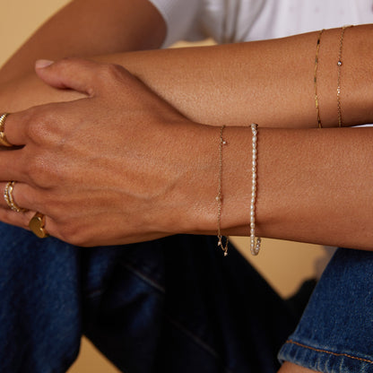 Pearl Rice Bracelet by Gjenmi stacked with the Pearl Shaker Bracelet