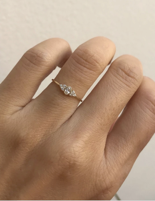 OVAL DIAMOND CLUSTER WHISPER RING