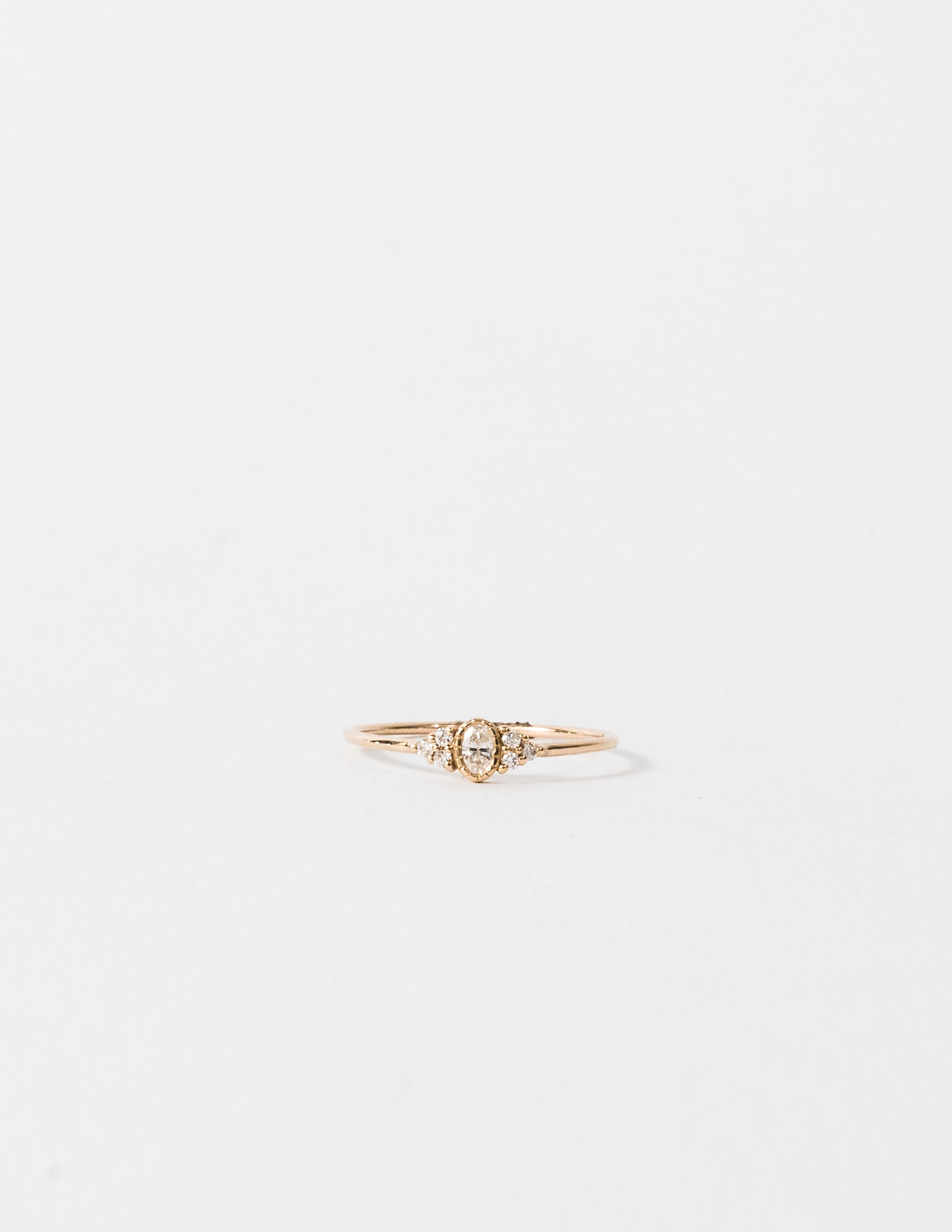 OVAL DIAMOND CLUSTER WHISPER RING