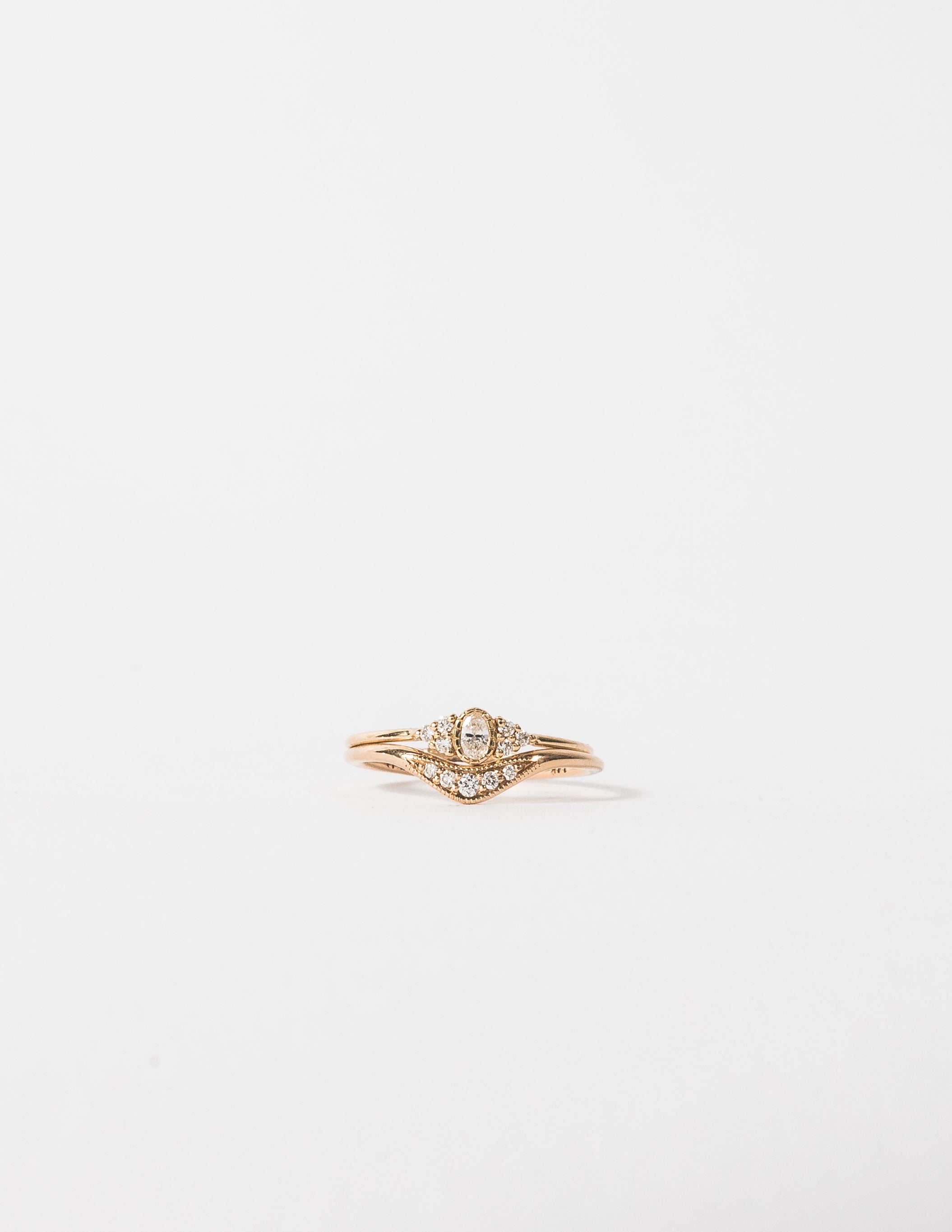 OVAL DIAMOND CLUSTER WHISPER RING